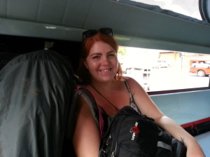 Heading to Chiang Mai airport in the back of a Songthaew. Backpacks and day bags ready to go.